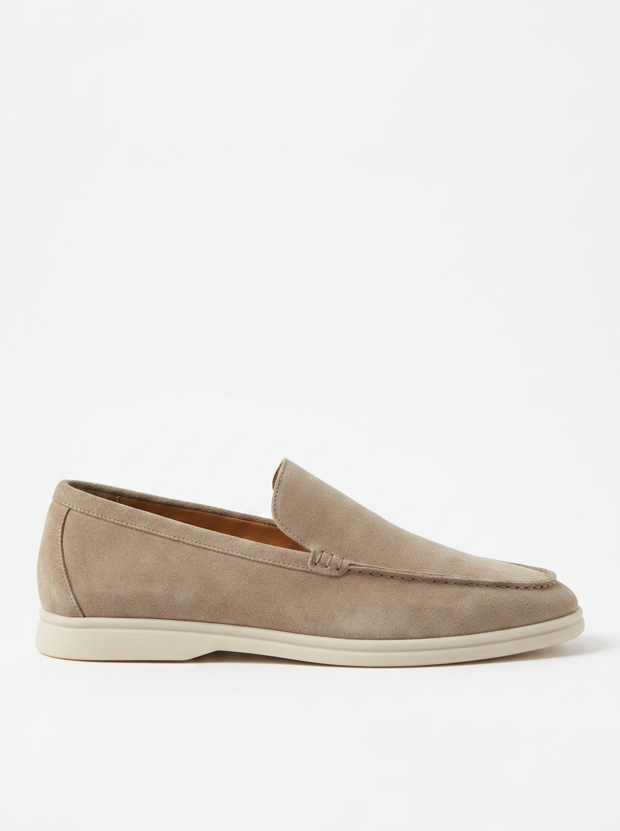 Beige suede laceless loafer, side profile